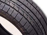 a close up of a tire on a white background