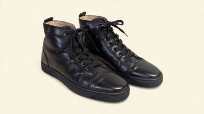 black leather high top sneakers with laces and rubber soles