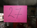 a pink sign with the number twenty on it