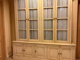 a large cabinet in the middle of a living room