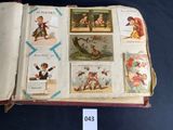 an open book with pictures of children and animals on it
