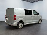 a picture of a silver van parked in a room