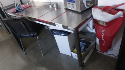 a small table with a microwave on top of it