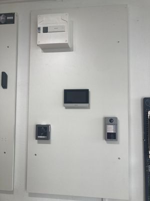 a picture of a wall with a bunch of electronic devices on it