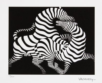 a black and white picture of two zebras in the dark