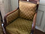a chair that is sitting in the corner of a room