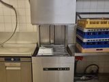 an image of a commercial kitchen with a dishwasher and other appliances