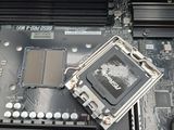 a close up of a motherboard with a cpu on it