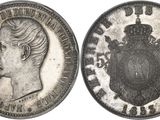 gros plan d'une pièce de monnaie sur laquelle figure un visage de femme
