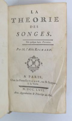 an open book with a picture of a bird on the cover