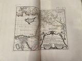 an open book with a map of the world on it