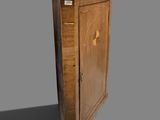 an image of a wooden cabinet with a door