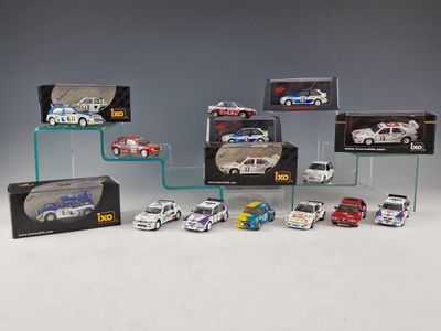 a lot of cars that are on display in a display case