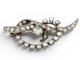 an antique diamond broochle, by van cleef