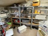 a room with a lot of shelves and bins on the floor