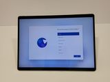 a tablet that has a screen displaying a webpage on it
