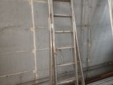 a ladder leaning up against a wall in a room