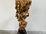 an image of a piece of wood that is on a stand