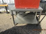 an image of a table with a cooler on top of it