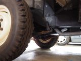 a close up view of a truck ' s front tire