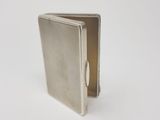 sterling silver cigarette case with a rounded opening