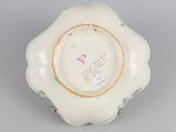 underside view of a porcelain bowl with a floral decoration
