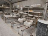 a large room with a lot of shelves and tables