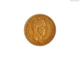 an image of a gold coin with a man ' s face on it