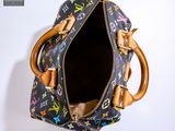 a purse that is hanging up on a wall
