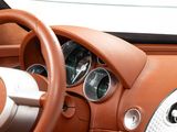 a close up of a steering wheel and dashboard of a car