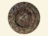 a picture of a circular object with a spiral design