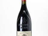a bottle of wine that is sitting on a table