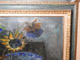 a painting of flowers in a blue vase on a table