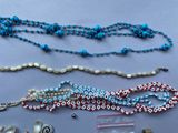 a lot of beads and beads that are on a table