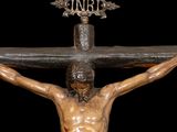 an image of a statue of jesus on a cross with a crown on his head