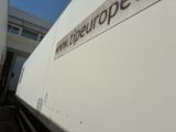 a truck that is parked in front of a building