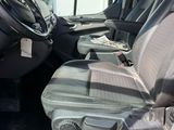 the interior of a van with the front seats down and the passenger seat down