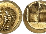 une pièce d'or portant l'image d'un homme et d'une femme