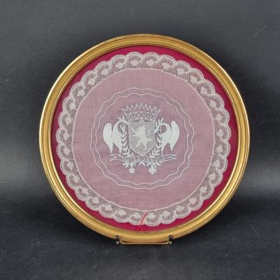 a picture of a pink and white plate with a crown on it