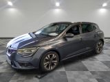 the grey car is parked on a checkered floor in the garage