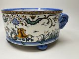 an image of a blue and white bowl with a lion on it