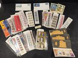 a lot of stamps and envelopes on the table
