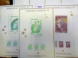 several different stamps on a table with a star on top of them
