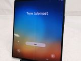 the screen of a tablet with a message on it sitting on top of a table