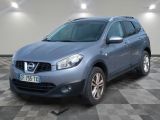 the blue nissan rav is parked on a checkered floor