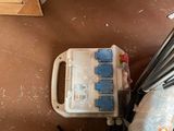 a bag and a bag of tools on the floor