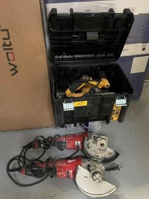 a box of tools and a pair of shoes on the floor