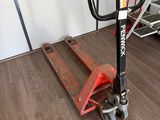 a picture of a hand truck in a garage