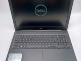 the dell laptop is open and ready to be used