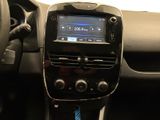the dashboard of a car with a steering wheel and a radio